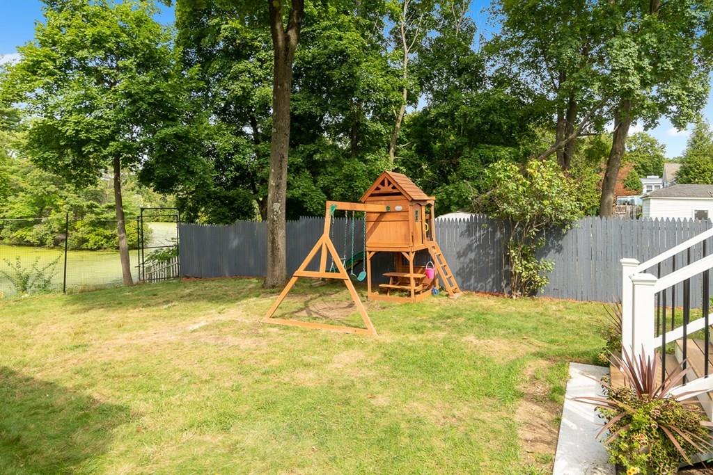 66 Manning Street Hudson, MA 01749 - Photo 30 of 40 a view of a yard with a slide