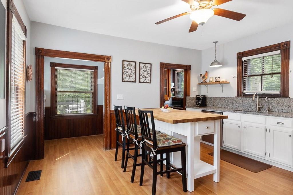 66 Manning Street Hudson, MA 01749 - Photo 3 of 40 a view of a dining room with furniture window and wooden floor