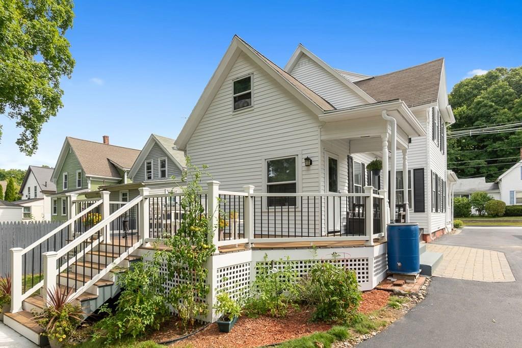 66 Manning Street Hudson, MA 01749 - Photo 34 of 40 a view of a house with a small yard and plants