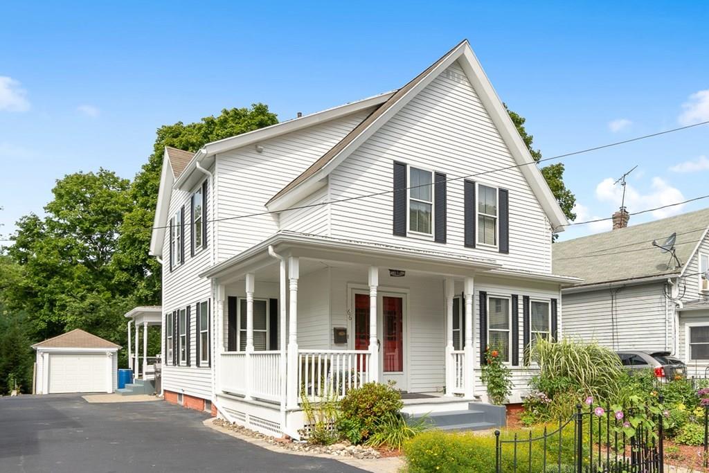 66 Manning Street Hudson, MA 01749 - Photo 36 of 40 a front view of a house with a yard