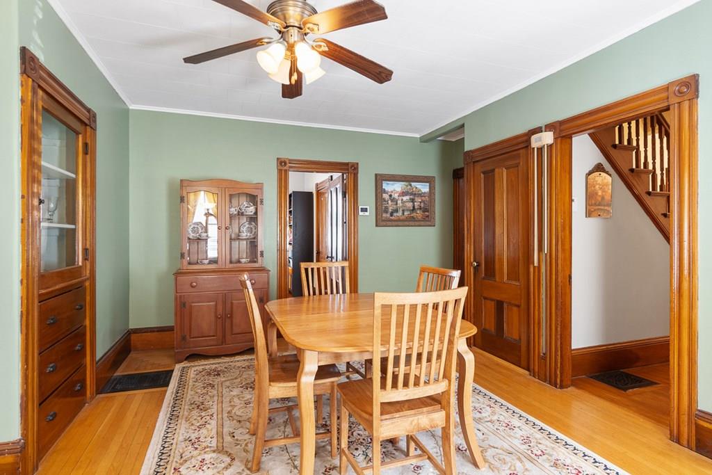 66 Manning Street Hudson, MA 01749 - Photo 7 of 40 a view of a dining room with furniture and a chandelier fan