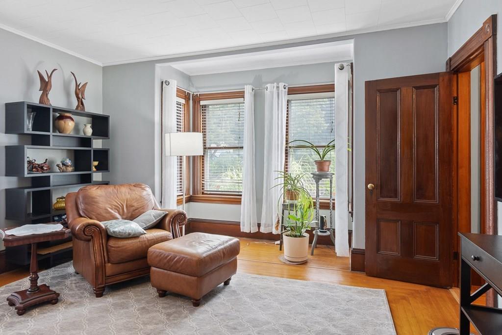 66 Manning Street Hudson, MA 01749 - Photo 10 of 40 a living room with furniture and a window