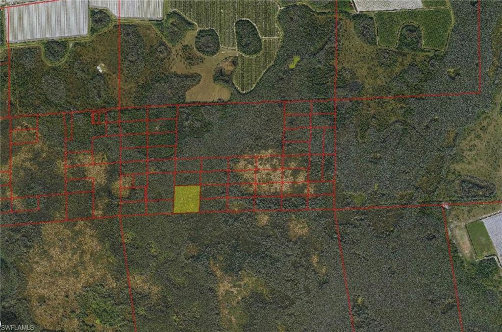 Aerial view of property's location with property parcel outlined