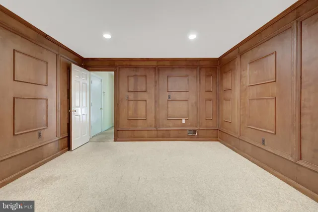 a view of a hallway with wooden floor and interior of the house