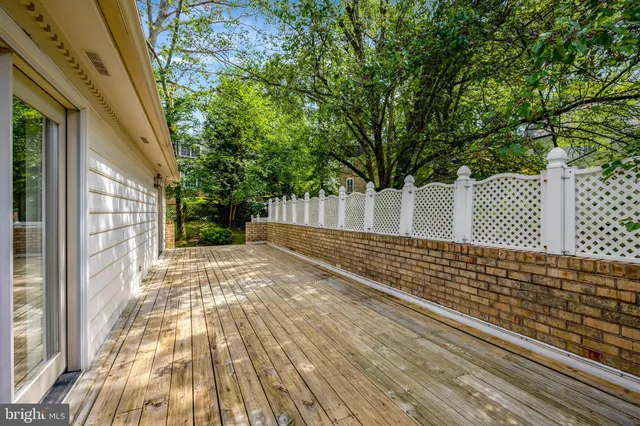 a bathroom with a granite countertop sink toilet tub and shower
