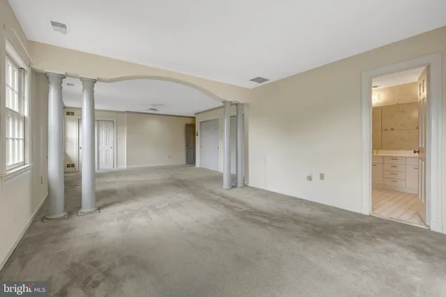 an empty room with windows