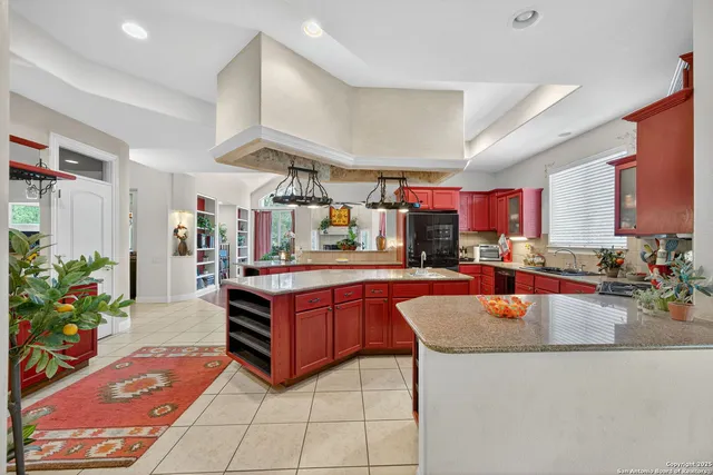 a kitchen with granite countertop a sink and counter space