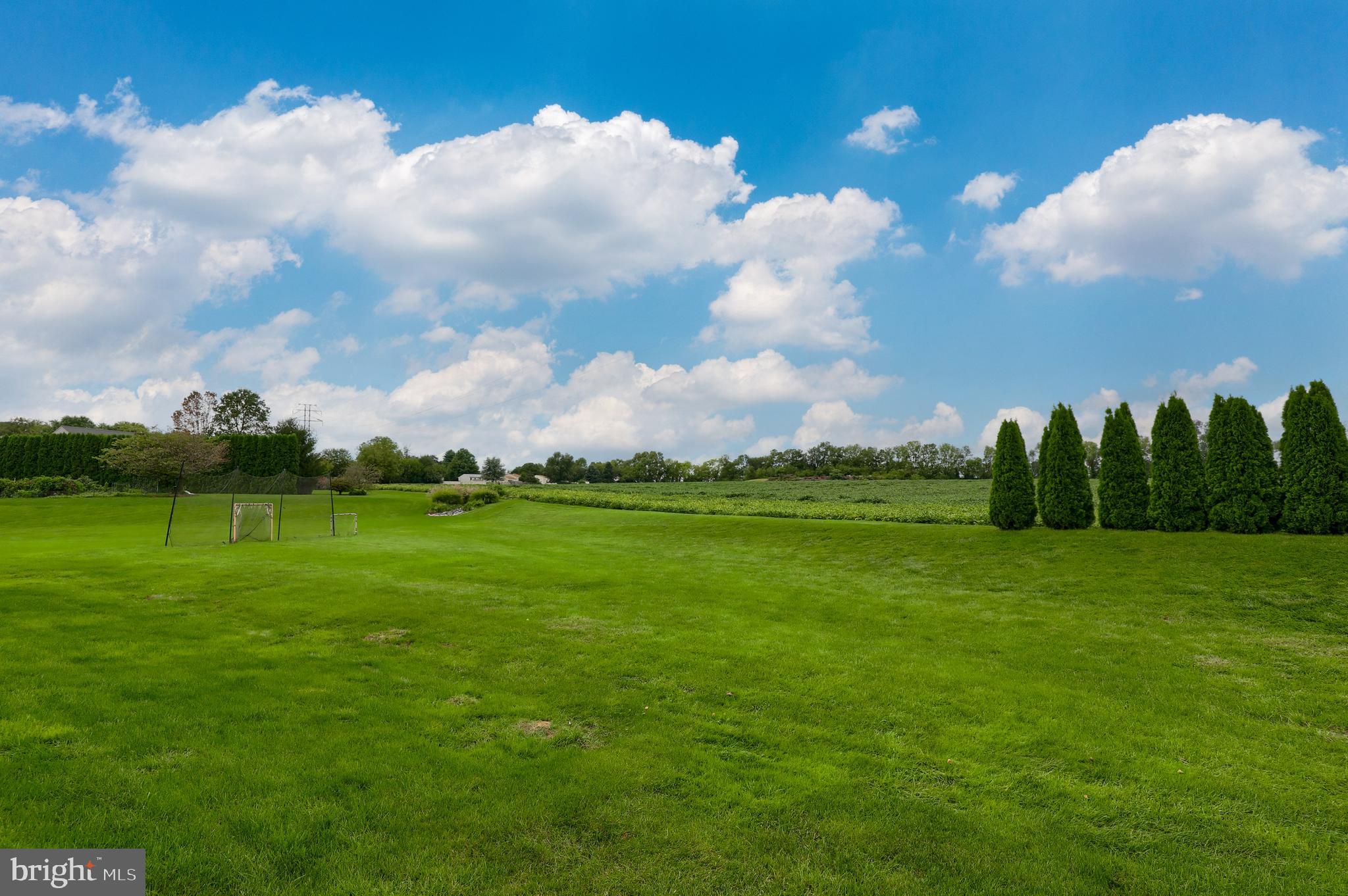 409 Wagonwheel Road Lititz, PA 17543 - Photo 2 of 40 a view of a golf course with an trees