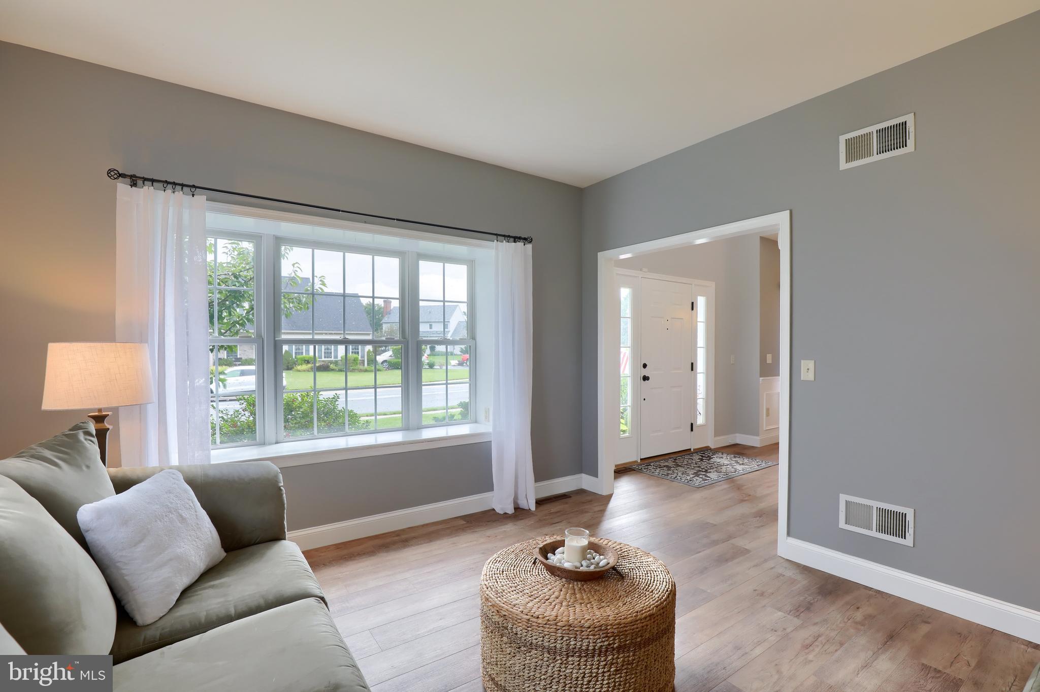 409 Wagonwheel Road Lititz, PA 17543 - Photo 11 of 40 a living room with furniture and a window