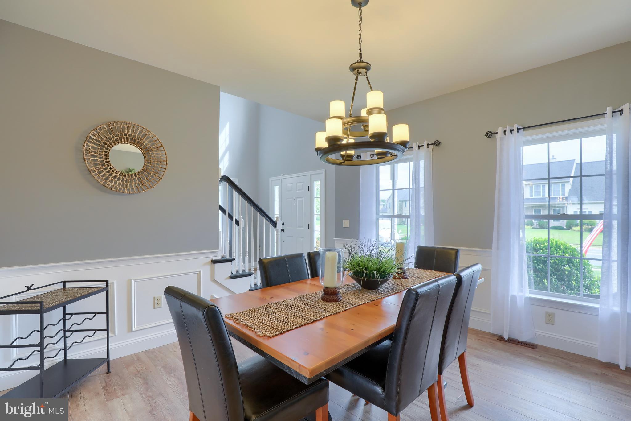 409 Wagonwheel Road Lititz, PA 17543 - Photo 21 of 40 a view of a dining room with furniture window and wooden floor