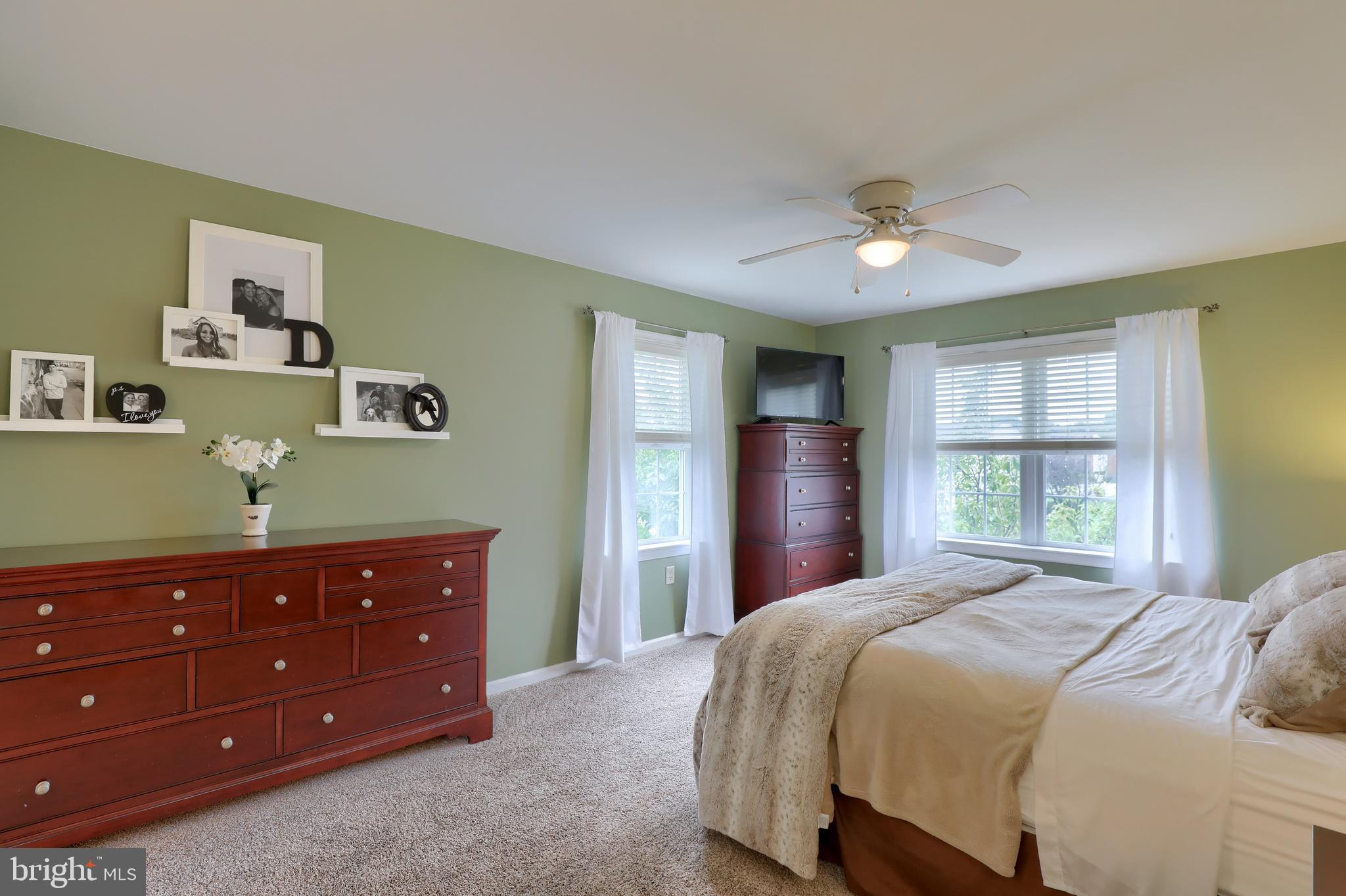 409 Wagonwheel Road Lititz, PA 17543 - Photo 29 of 40 a bedroom with a bed and a dresser
