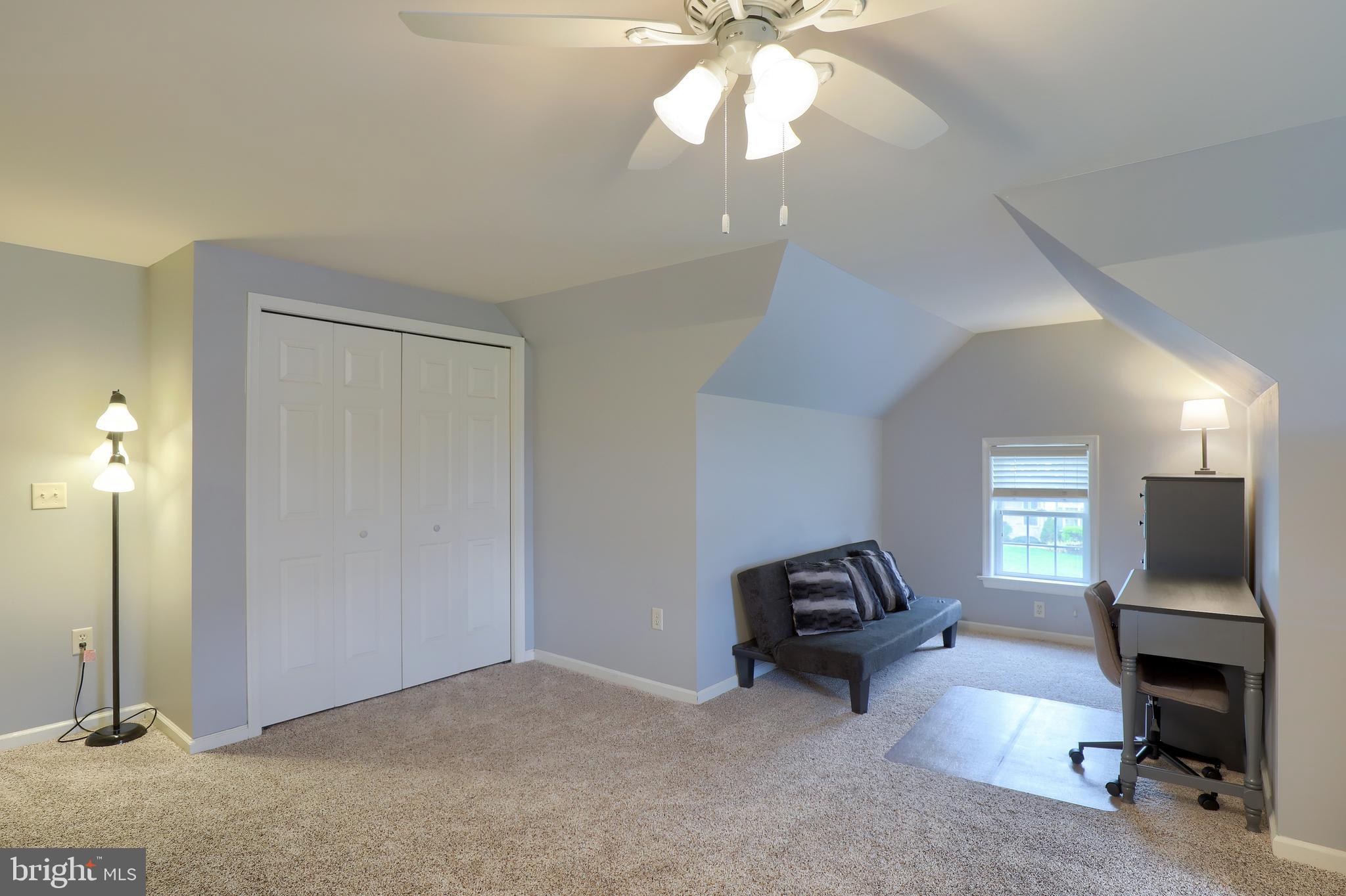 409 Wagonwheel Road Lititz, PA 17543 - Photo 34 of 40 a view of a livingroom with furniture and a ceiling fan