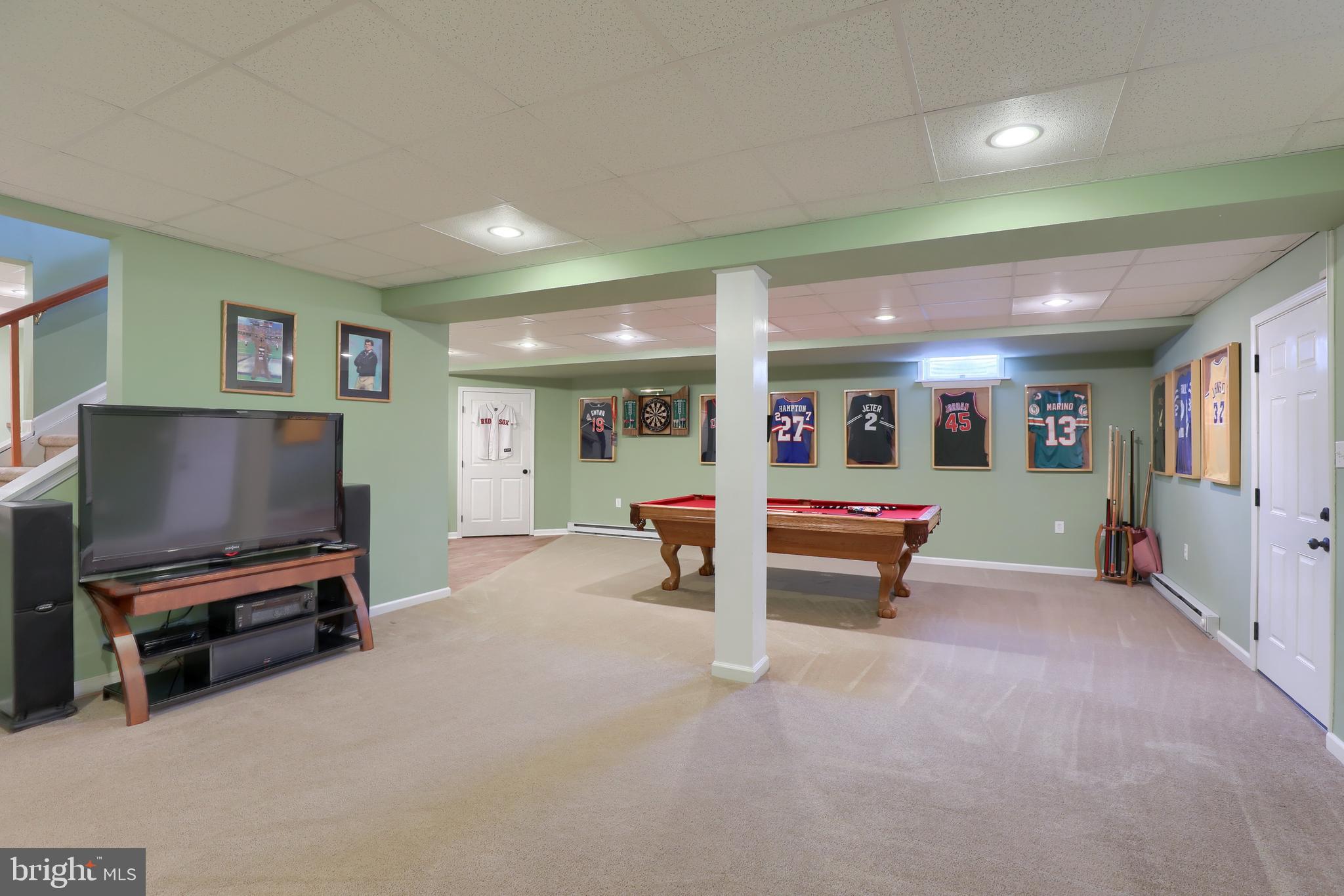 409 Wagonwheel Road Lititz, PA 17543 - Photo 36 of 40 a living room with furniture and a flat screen tv