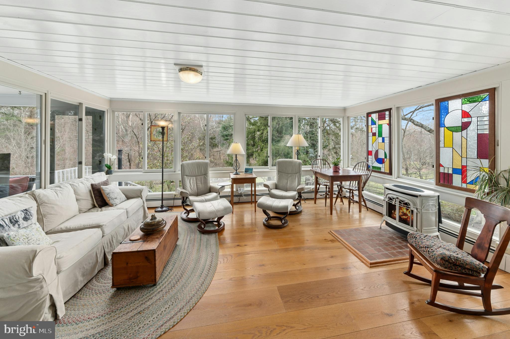 2885 Mill Road Doylestown, PA 18902 - Photo 17 of 50 a living room with furniture and a flat screen tv