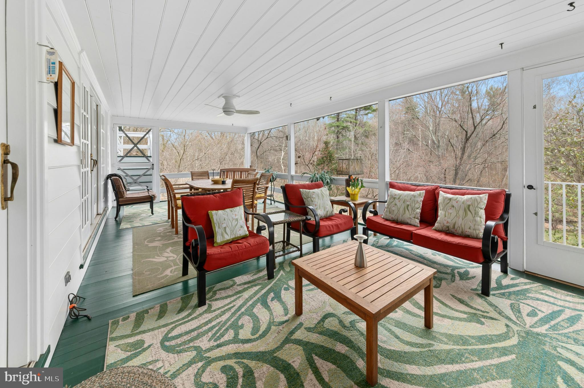 2885 Mill Road Doylestown, PA 18902 - Photo 19 of 50 a living room with furniture and a fireplace