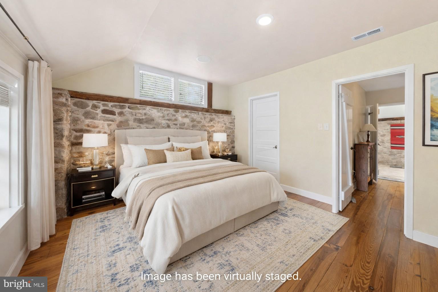 2885 Mill Road Doylestown, PA 18902 - Photo 34 of 50 a bedroom with a bed and wooden floor