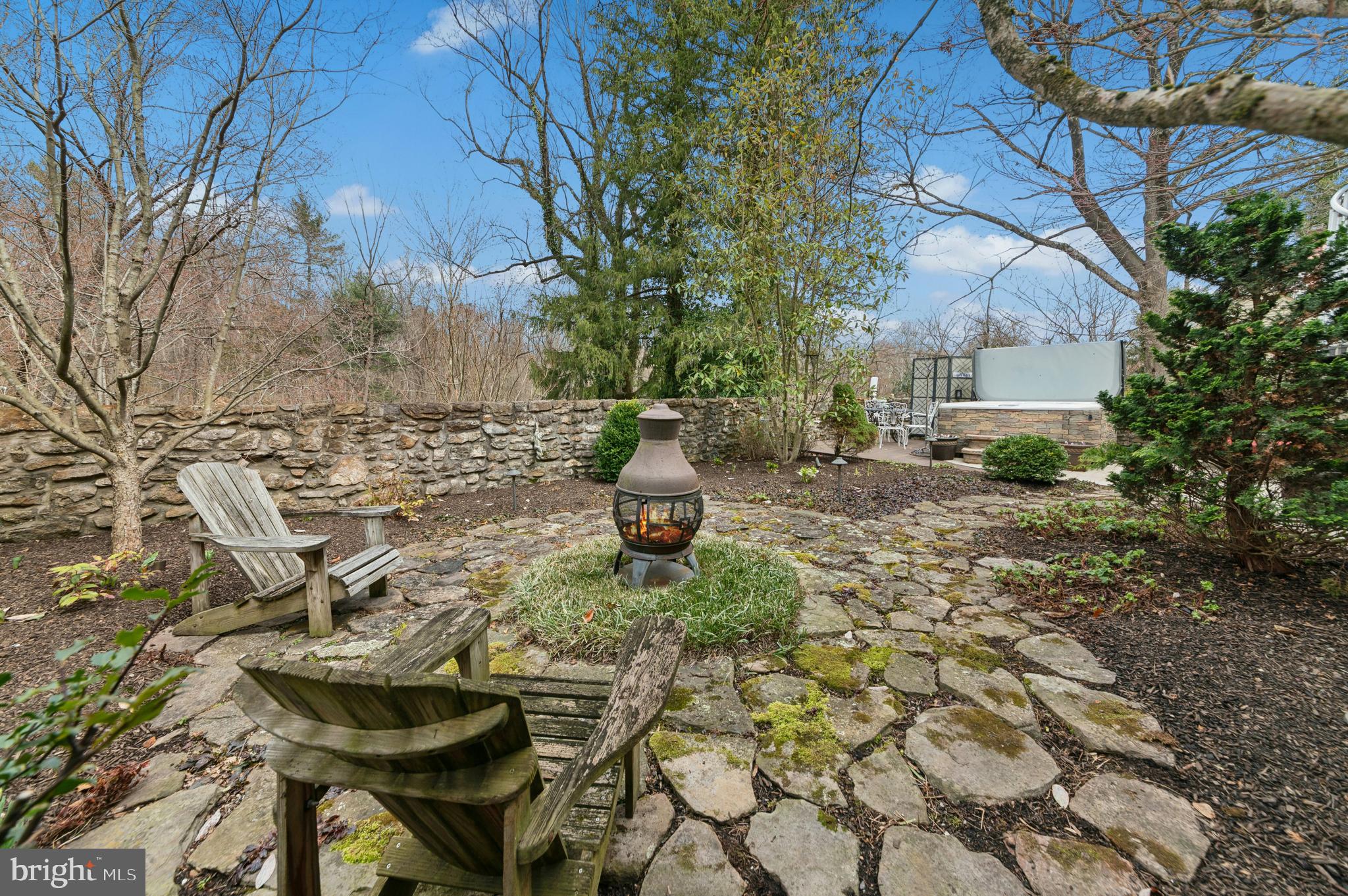 2885 Mill Road Doylestown, PA 18902 - Photo 44 of 50 a backyard of a house with table and chairs