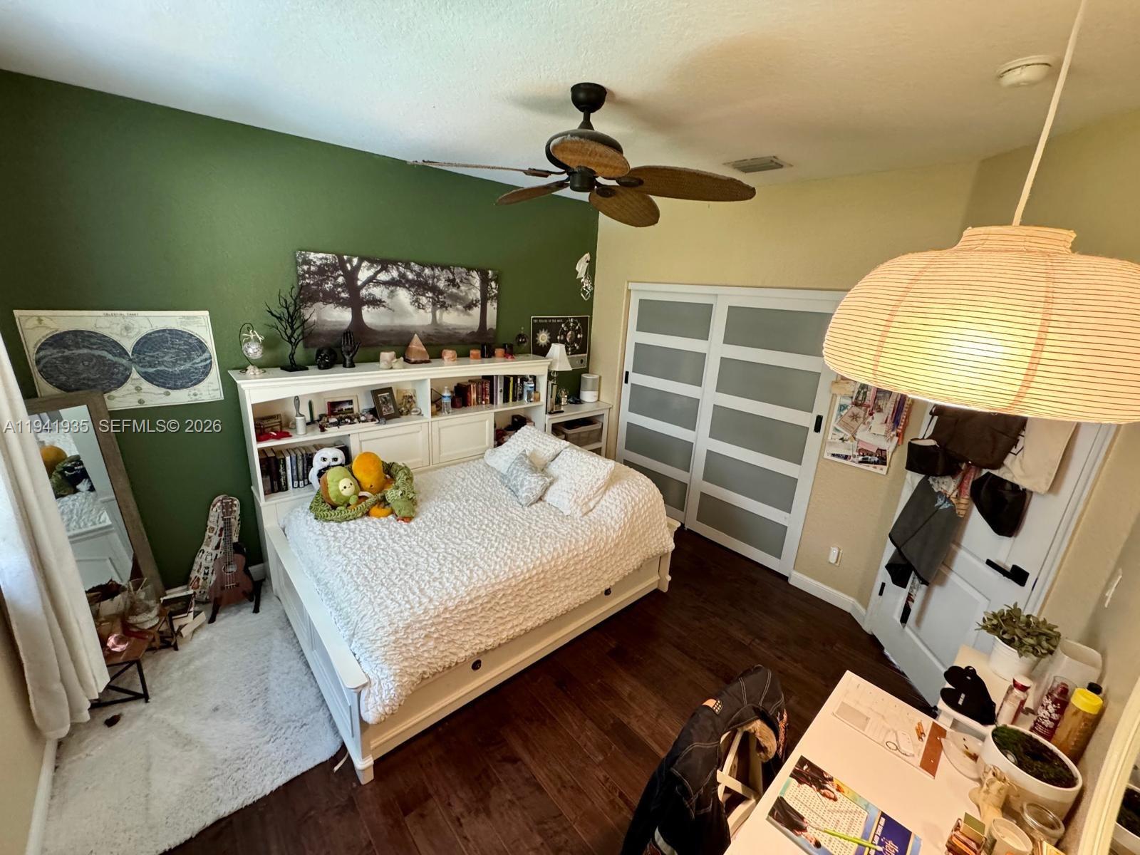 12917 Southwest 23rd Street Miramar, FL 33027 - Photo 24 of 47 a bed room with a bed and a window