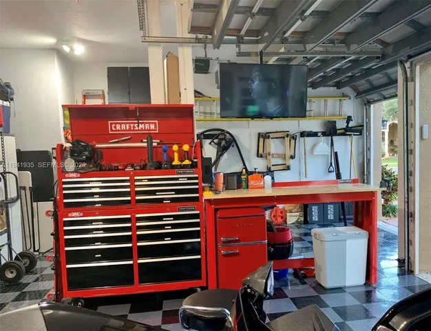 a room with table and chairs