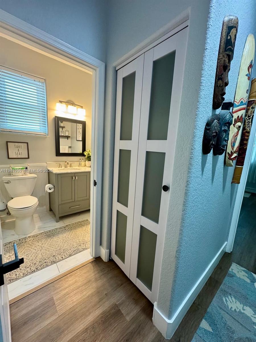 12917 Southwest 23rd Street Miramar, FL 33027 - Photo 31 of 47 a view of bathroom with a sink and a mirror