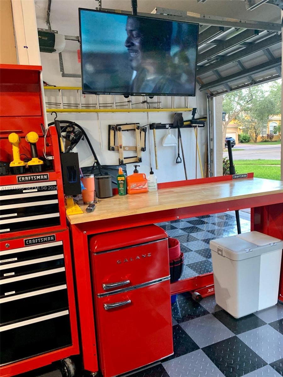 12917 Southwest 23rd Street Miramar, FL 33027 - Photo 45 of 47 a room with table and chairs