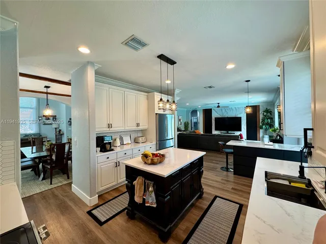 a living room with furniture and a table