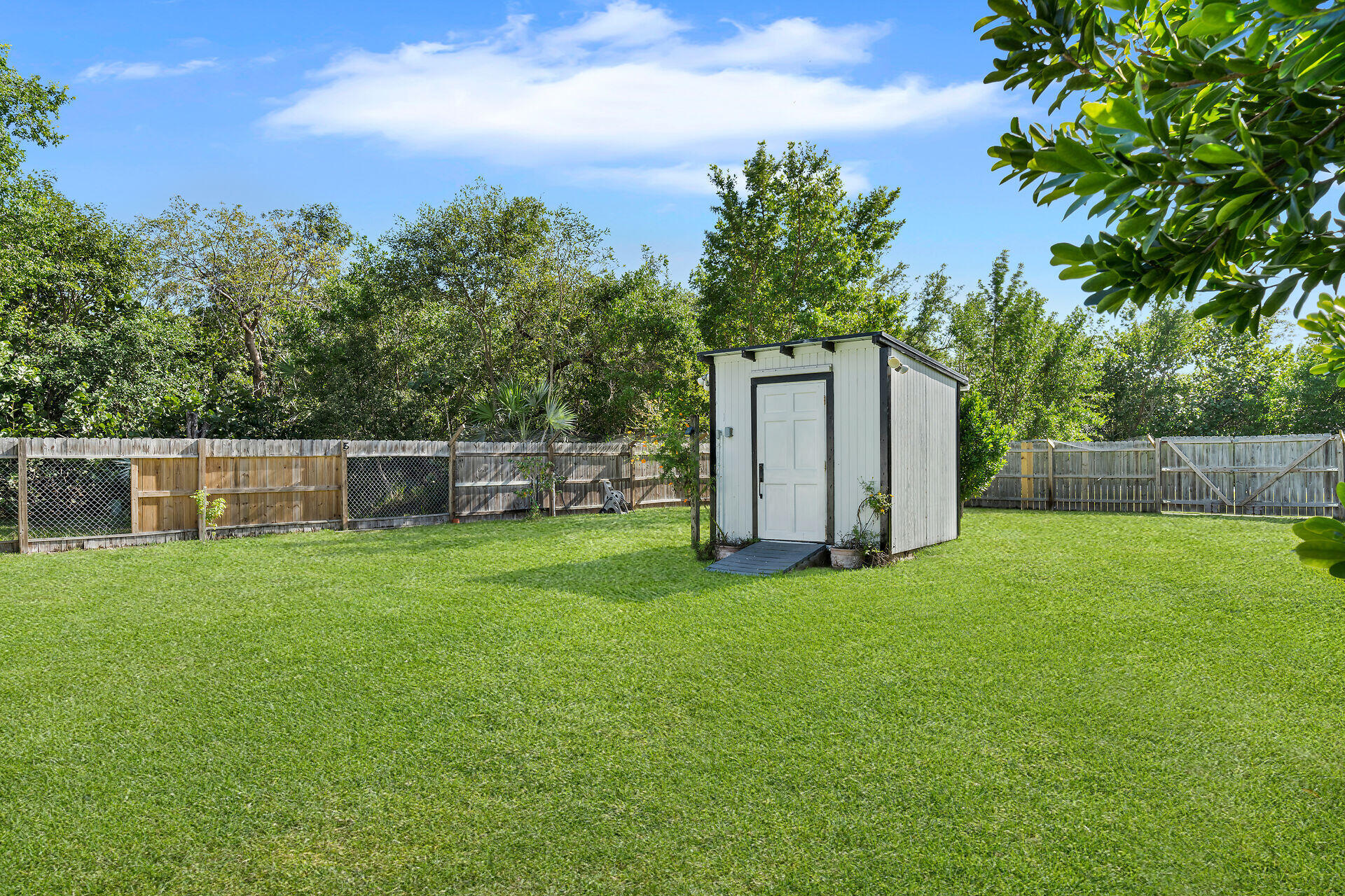30246 Watson Boulevard Big Pine Key, FL 33043 - Photo 25 of 48 a house with a tree in front of it