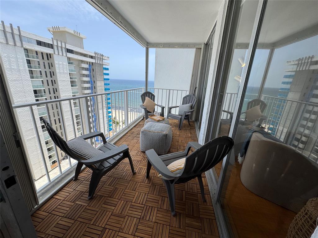 a view of a chairs in the balcony