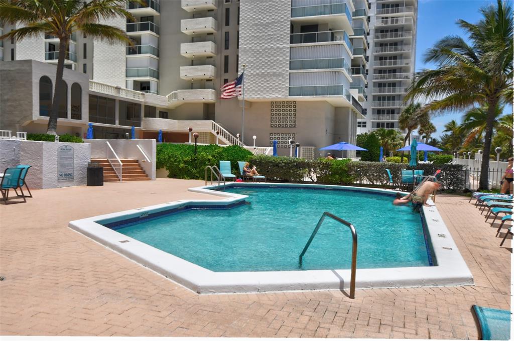 1010 South Ocean Boulevard, Unit 1612 Pompano Beach, FL 33062 - Photo 21 of 35 a view of a building with a garden
