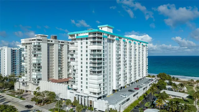 a view of city with ocean