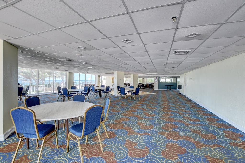 1010 South Ocean Boulevard, Unit 1612 Pompano Beach, FL 33062 - Photo 30 of 35 a view of a dining room with furniture