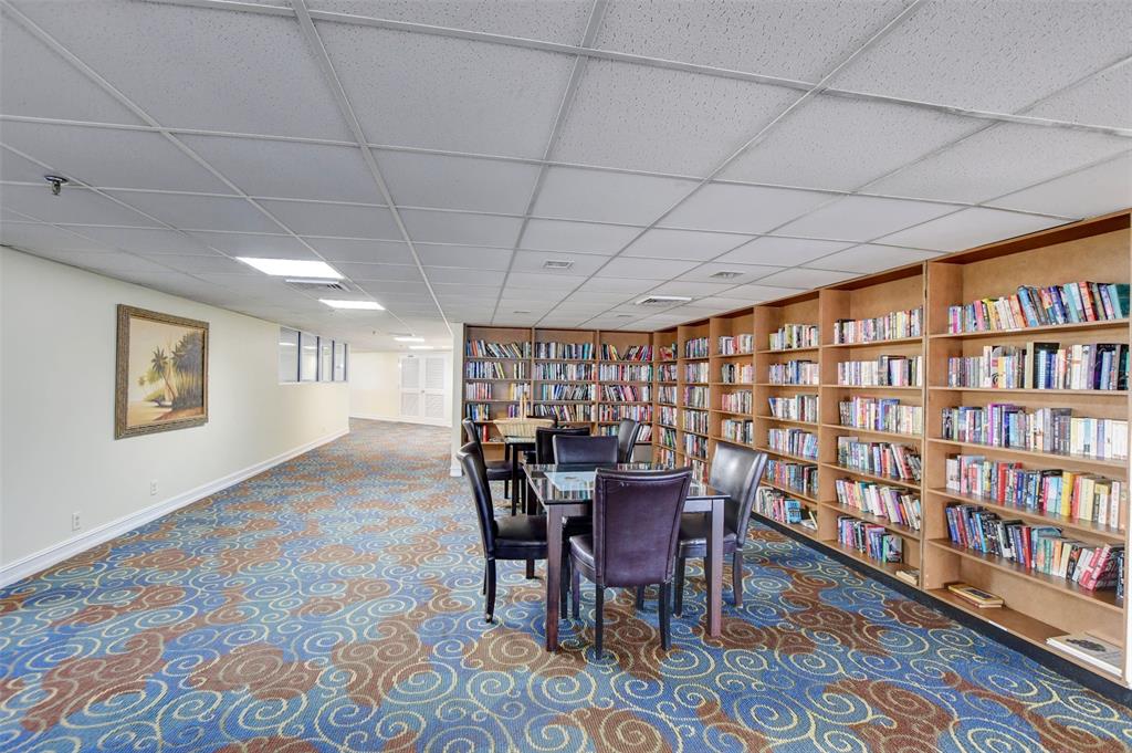 1010 South Ocean Boulevard, Unit 1612 Pompano Beach, FL 33062 - Photo 31 of 35 a view of a dining room with furniture window and wooden floor
