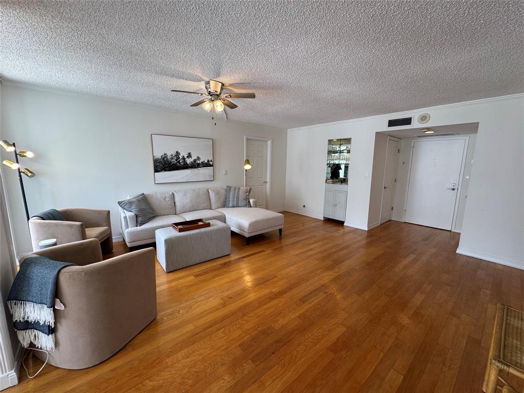 1010 South Ocean Boulevard, Unit 1612 Pompano Beach, FL 33062 - Photo 8 of 35 a bed room with furniture and a window