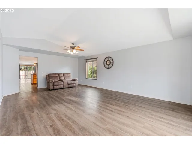 a view of livingroom with furniture and wooden floor