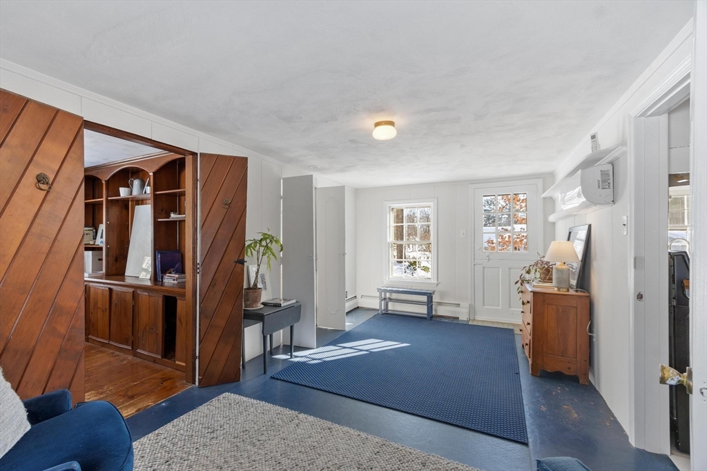 54 Birch Road Andover, MA 01810 - Photo 26 of 37 a view of livingroom with hardwood floor and furniture