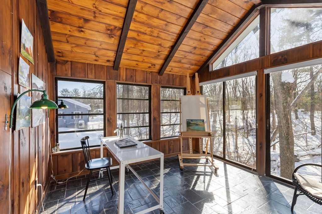 54 Birch Road Andover, MA 01810 - Photo 32 of 37 a view of a dining room with furniture window and outside view
