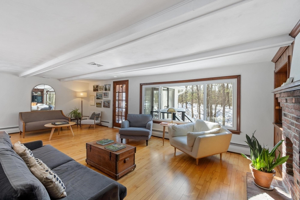 54 Birch Road Andover, MA 01810 - Photo 5 of 37 a living room with furniture and a large window