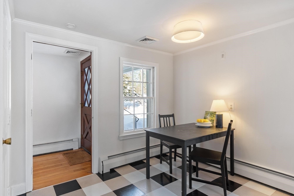 54 Birch Road Andover, MA 01810 - Photo 8 of 37 a view of a dining room with a table and chairs