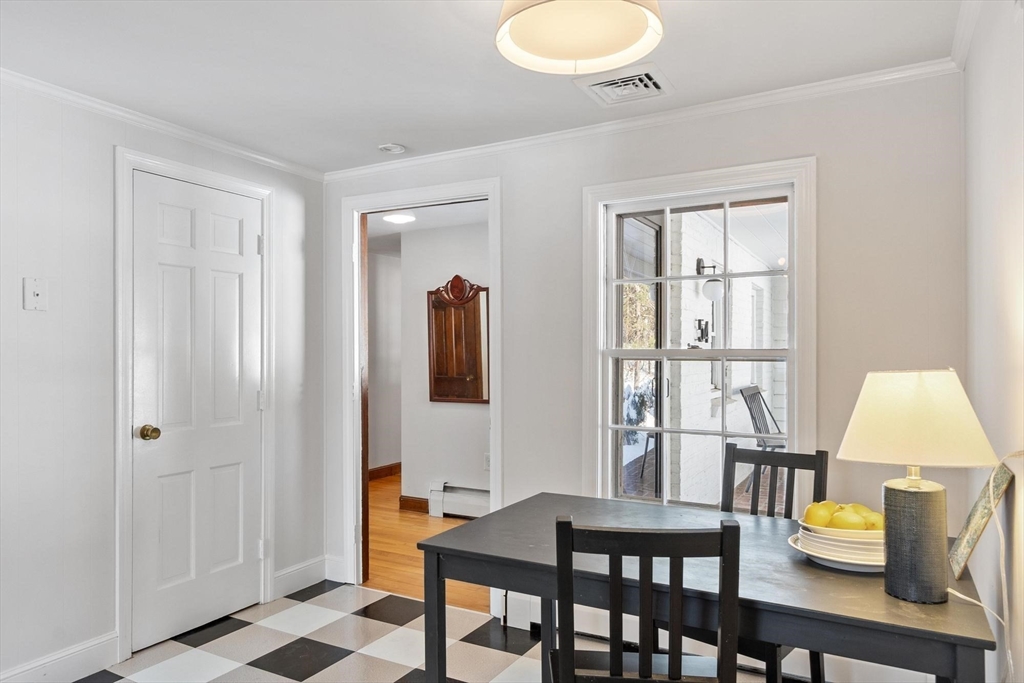 54 Birch Road Andover, MA 01810 - Photo 9 of 37 a view of a dining room with furniture and a window