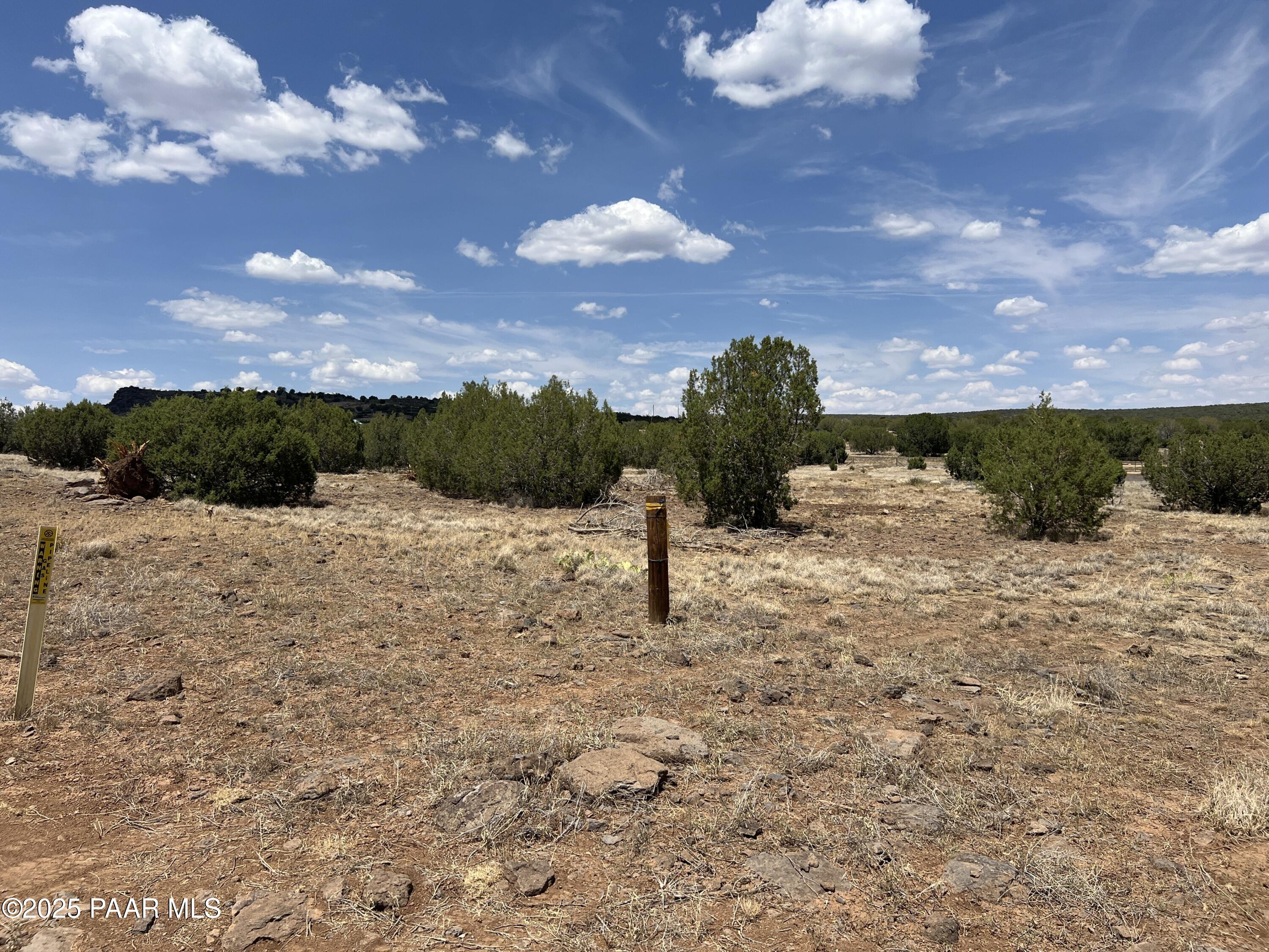 11 Old Rte 66 Ash Fork, AZ 86320 - Photo 10 of 20 a view of a lake with a house in the background