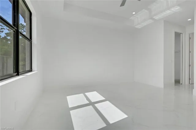 an empty room with windows