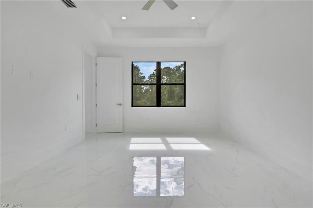 3780 6th Avenue Southeast Naples, FL 34117 - Photo 16 of 33 an empty room with windows