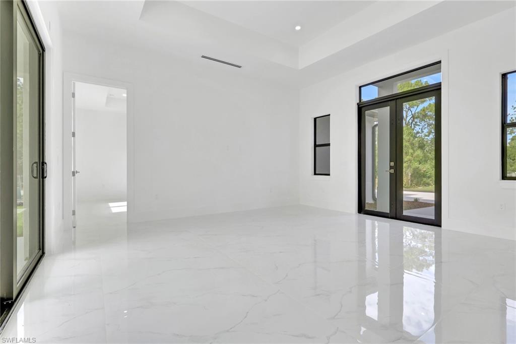 3780 6th Avenue Southeast Naples, FL 34117 - Photo 8 of 33 a view of an empty room with window