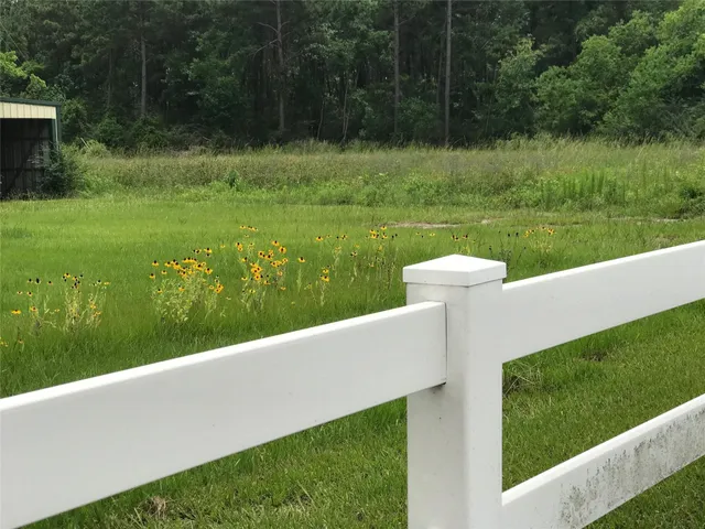 a view of a garden and lake