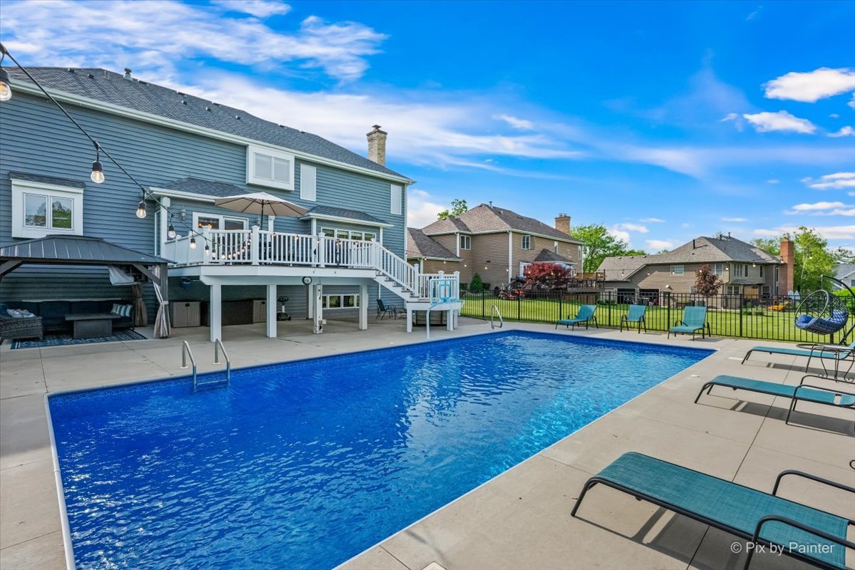 7104 Dove Way Cary, IL 60013 - Photo 61 of 82 a view of a swimming pool with seating space
