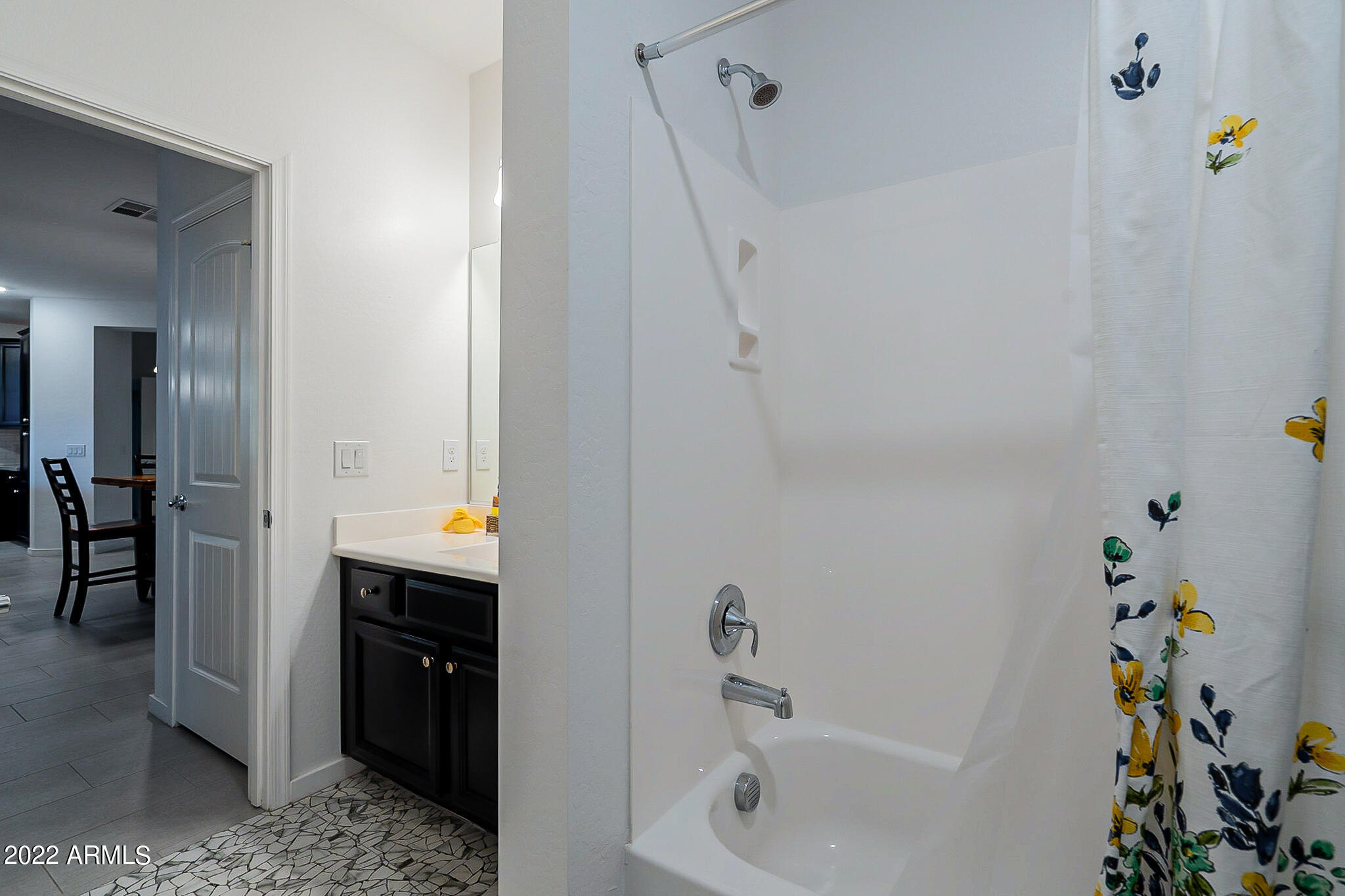 3900 East Baseline Road, Unit 142 Phoenix, AZ 85042 - Photo 24 of 28 a bathroom with a tub sink and mirror