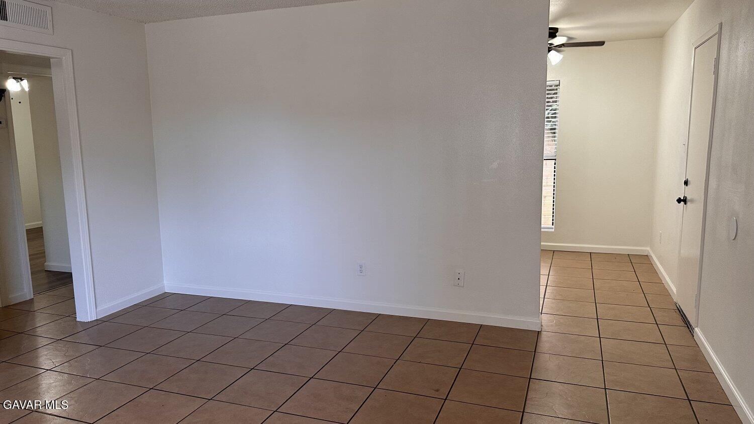 3901 Soranno Avenue, Unit C Bakersfield, CA 93309 - Photo 4 of 11 an empty room with a bathroom