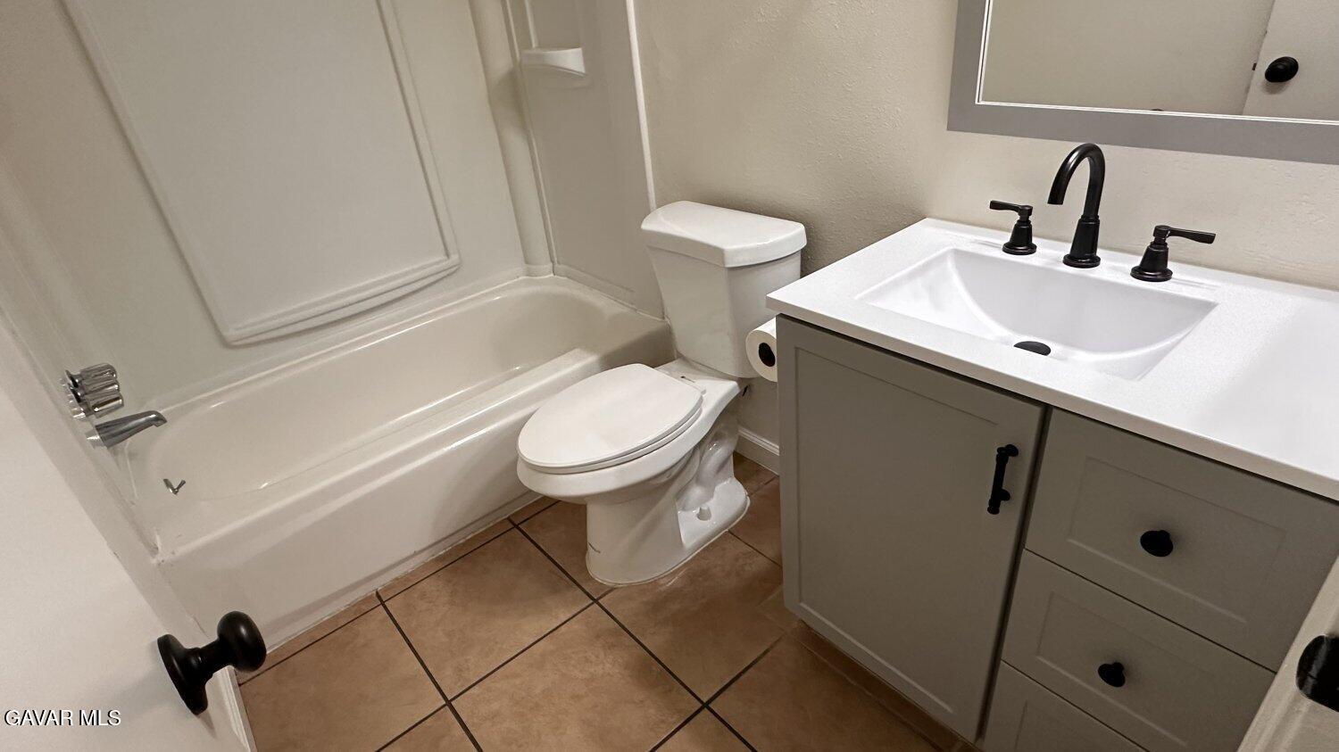 3901 Soranno Avenue, Unit C Bakersfield, CA 93309 - Photo 5 of 11 a bathroom with a sink and a toilet