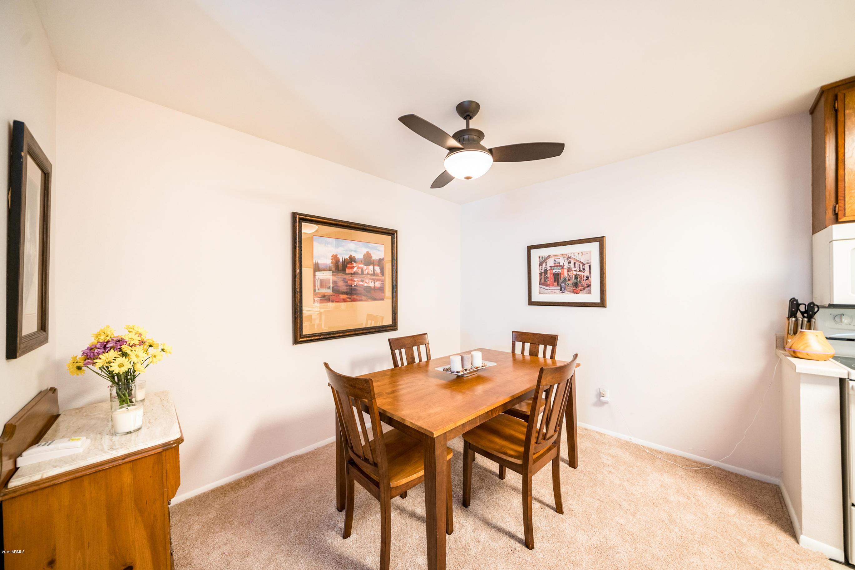 5525 East Thomas Road, Unit B6 Phoenix, AZ 85018 - Photo 3 of 21 a dining room with furniture and window