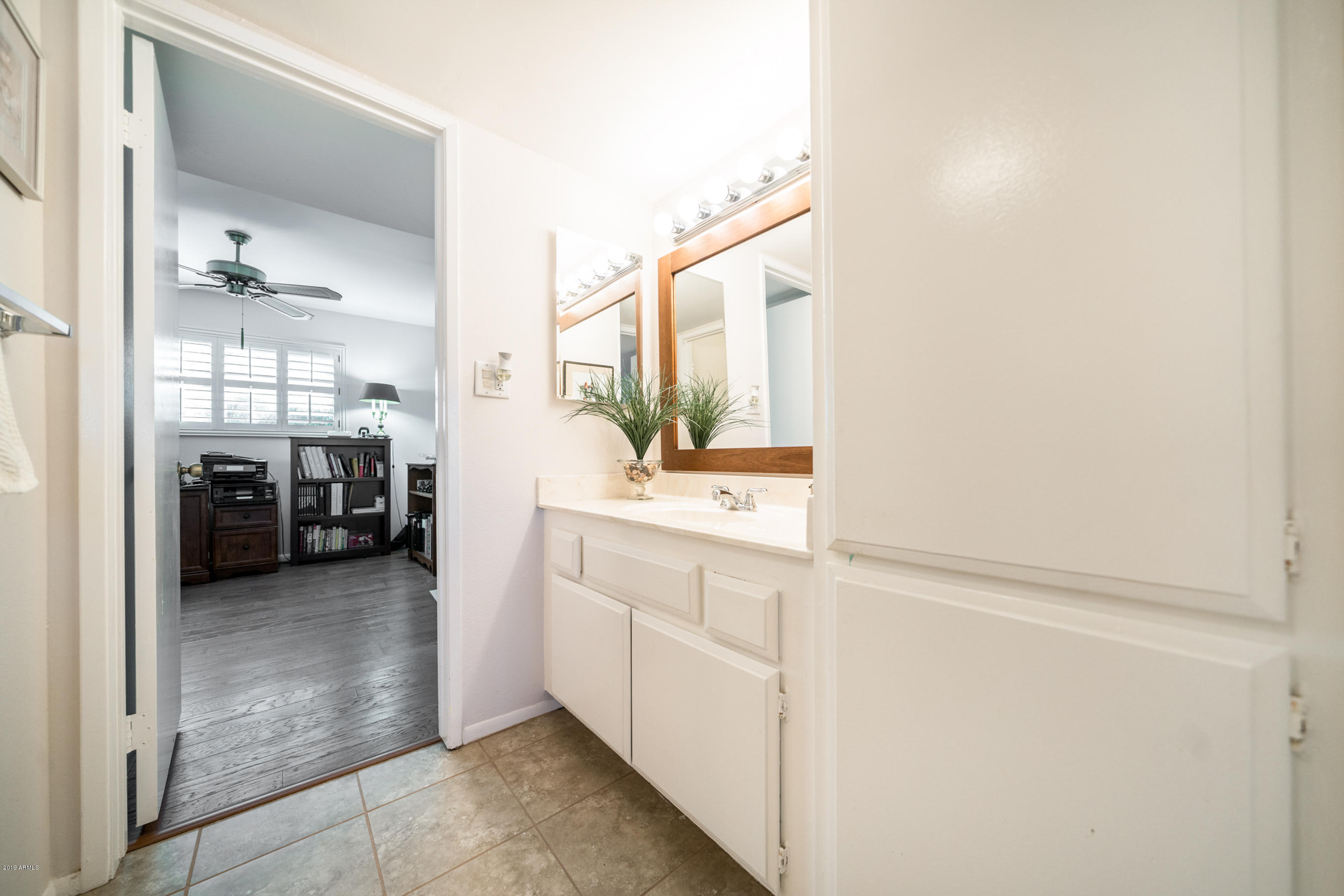5525 East Thomas Road, Unit B6 Phoenix, AZ 85018 - Photo 10 of 21 a view of a kitchen from the hallway